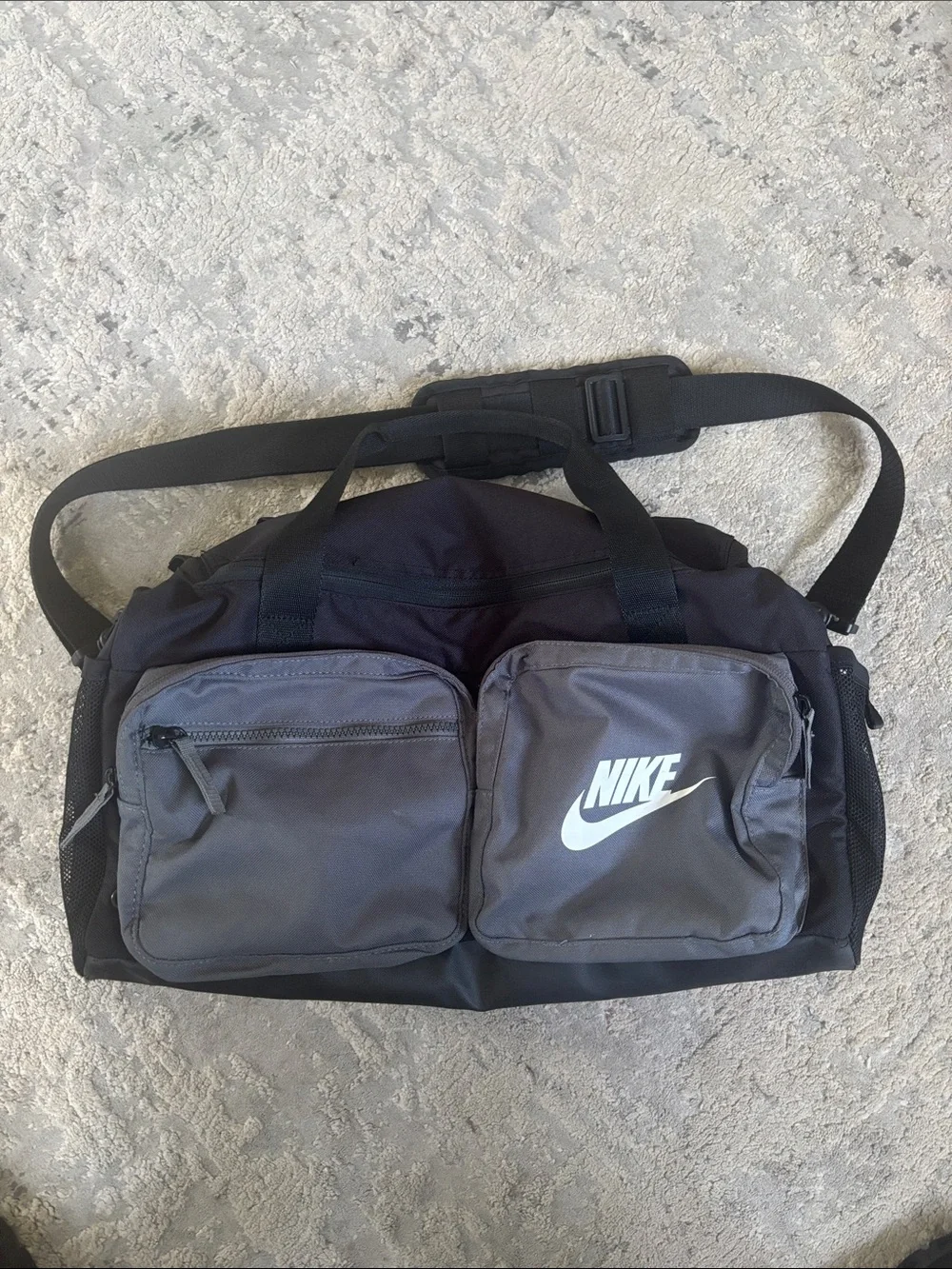 Nike Black and Gray Men’s Duffel Bag with Dual Front Pockets
